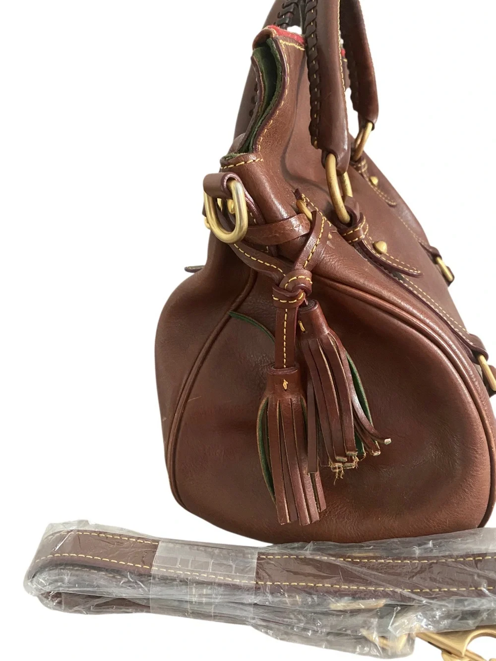 Dooney & Bourke Brown Leather Satchel with Gold Hardware and Tassel